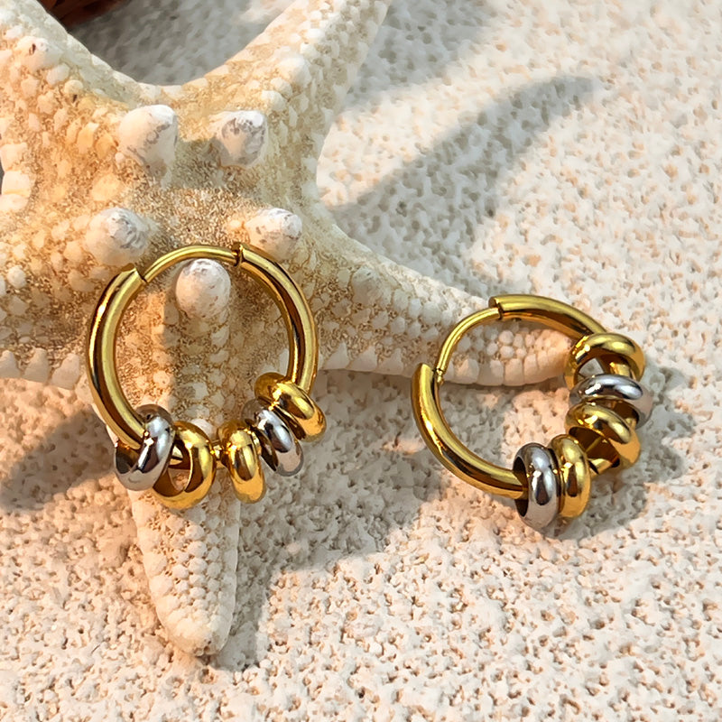 silver and gold beads hugs